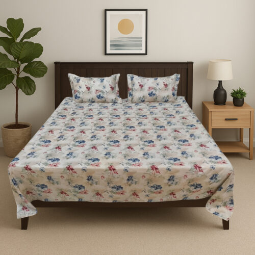 Floral pattern bed sheet set styled in modern bedroom with dark wood furniture, showing blue pink botanical design bedding by Vardhman Mills in realistic home setting