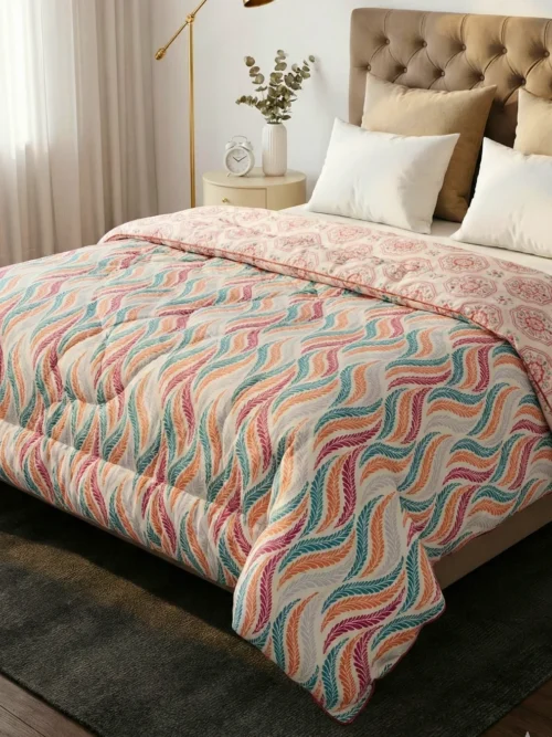 Coral Wave heavy winter rajai on king size bed - 450 GSM colourful wave quilt with teal and pink print