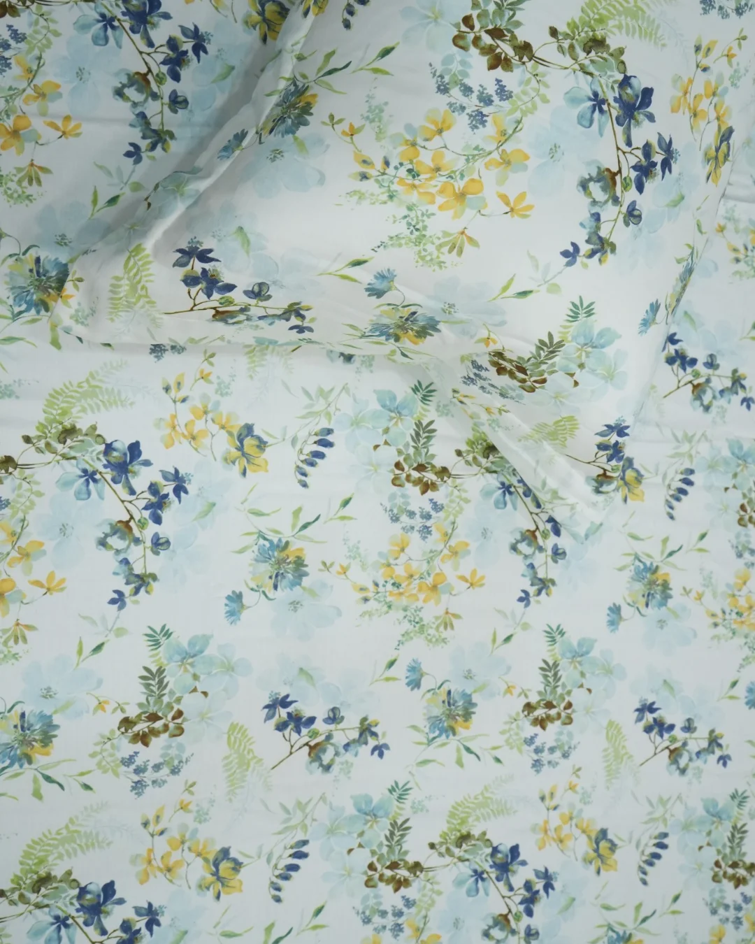 Spring Wildflower - Digital Print Bedsheet | 100% Cotton Digital Bedsheet Set with Pillow Covers 2 Digital print cotton bedsheet close-up showing delicate wildflower pattern with soft blue, yellow and olive green florals on white background