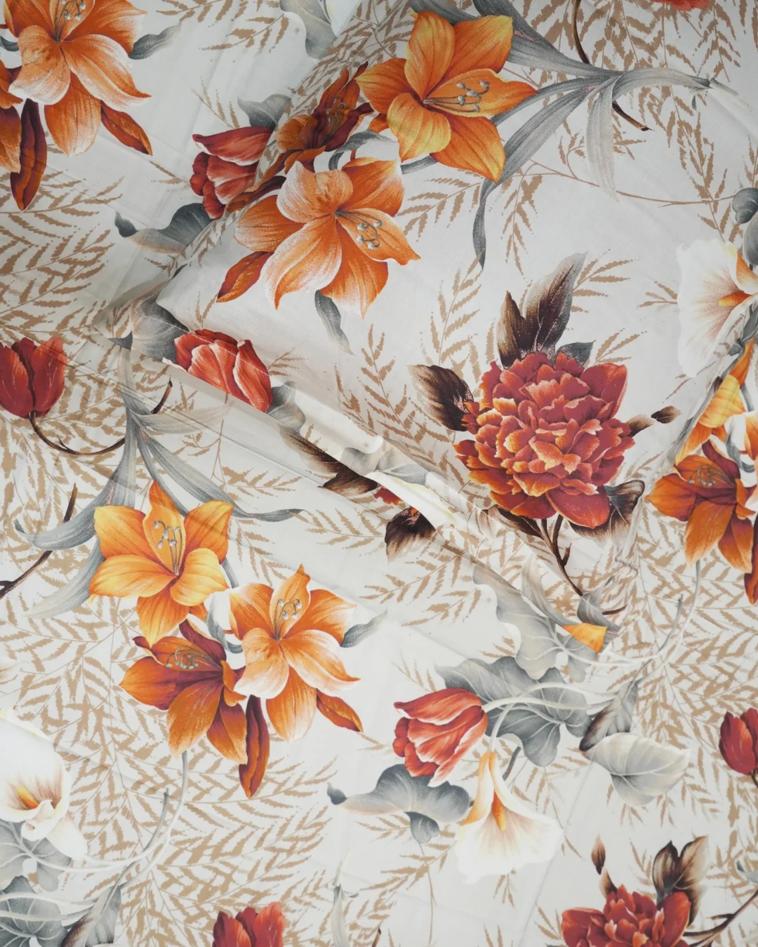Sunset Lily - Digital Print Bedsheet | 100% Cotton Digital Bedsheet Set with Pillow Covers 2 Digital print cotton bedsheet close-up showing sunset lily floral pattern with orange lilies burgundy dahlias grey-blue feathery ferns on cream background