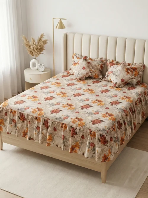 Frill bedsheet king size set in Autumn Bloom pattern - 100% cotton frilled bedsheet with ruffle skirt, matching pillow covers and filled cushions in orange rust floral print on cream