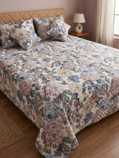 Misty Jacobean floral bed cover on bed – quilted 100% cotton 300 TC with pillow and cushion covers by Vardhman Mills