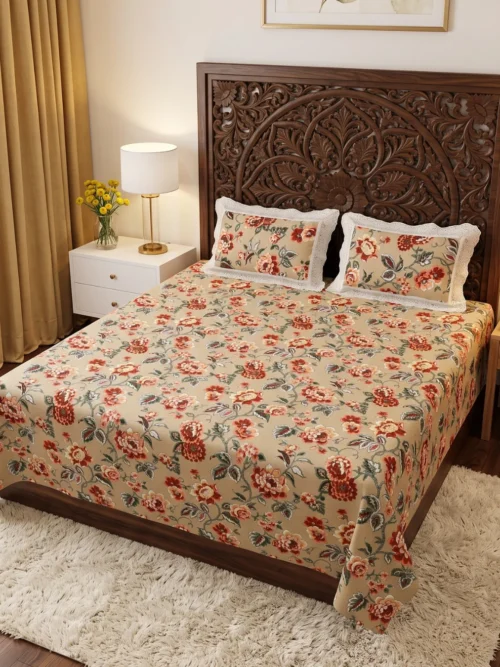 Autumn Blossom red floral bedsheet king size in beige with rust blooms on a carved wooden bed
